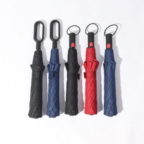 Umbrella with carabiner handle